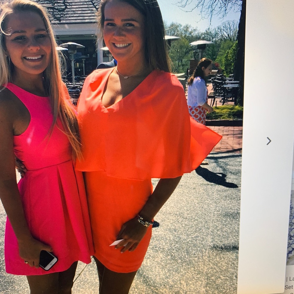 Orange over the shoulder dress